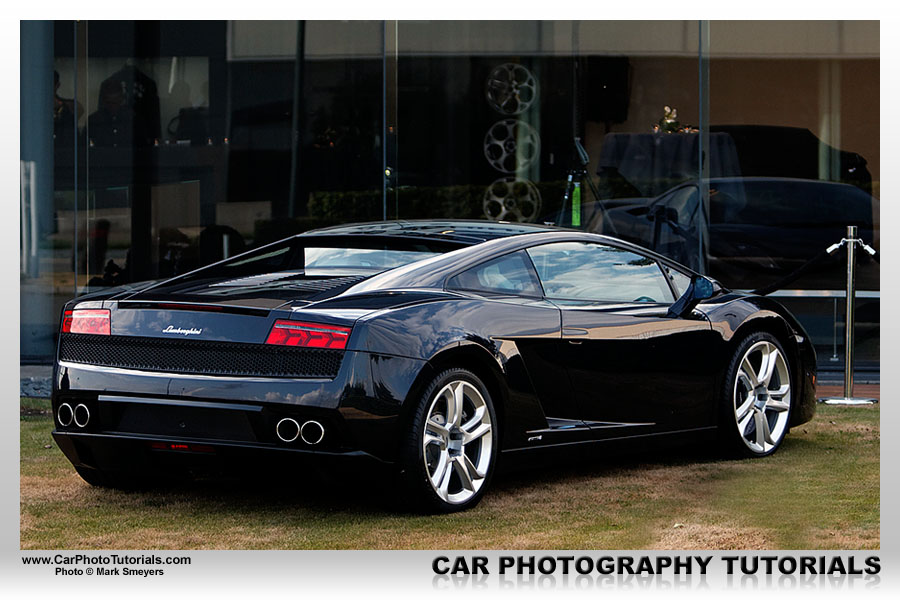 A white Gallardo LP5604 with a similar yellow one in the background